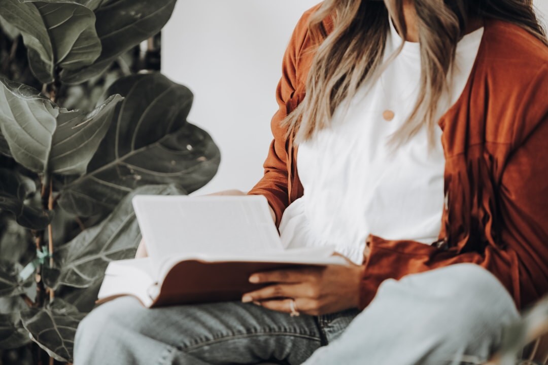 woman reading mystery book